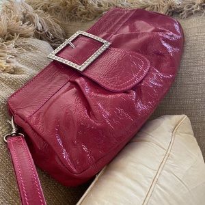 Pink clutch/purse with wristlet. 11x6